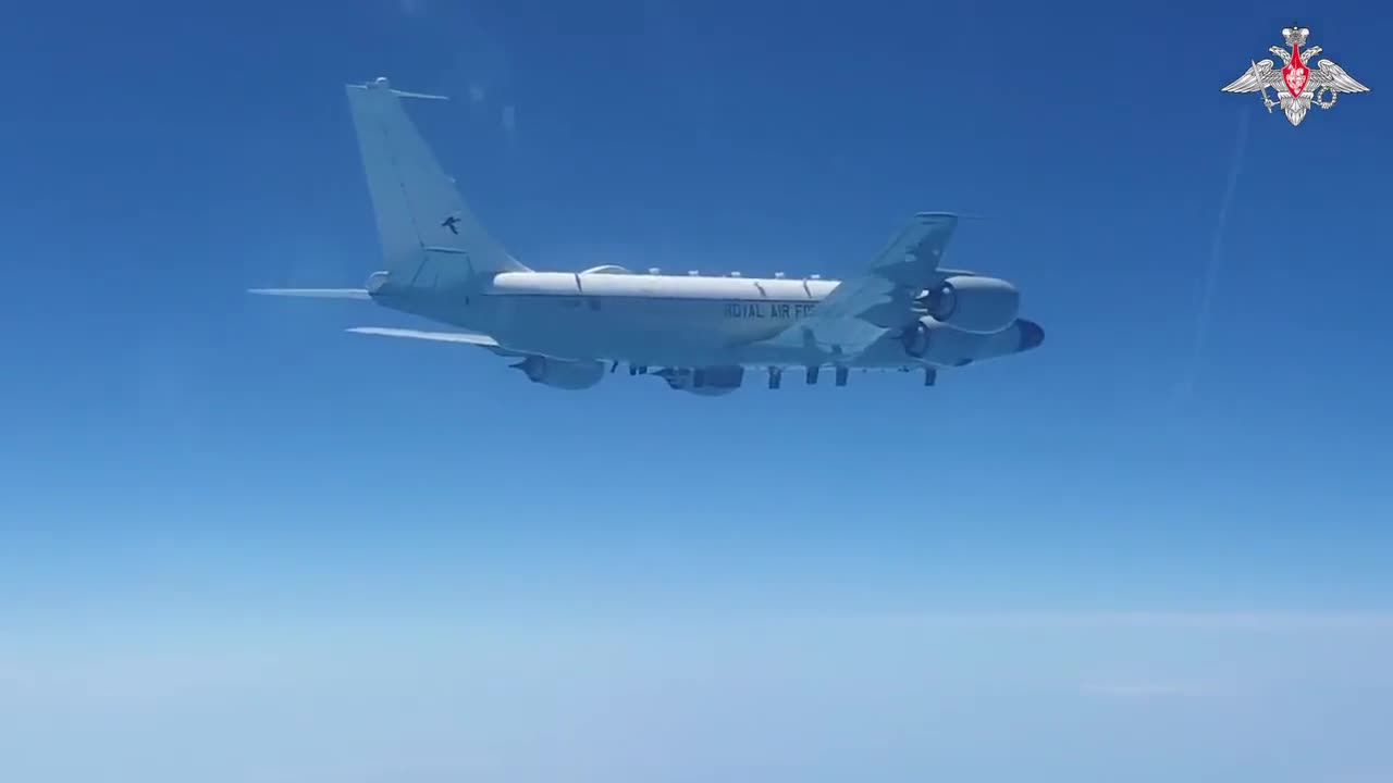 Two SU27 Russian aircraft escort reconnaissance plane with two British fighter planes over Black Sea