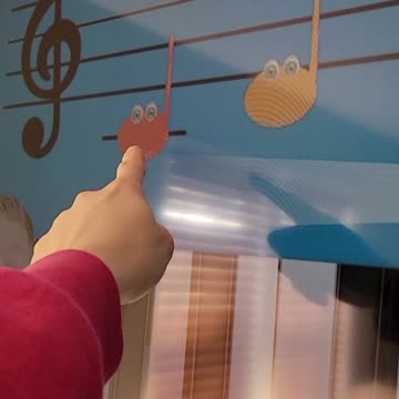Toddler reading music