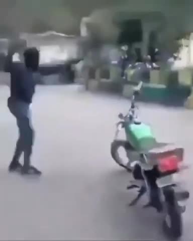 African motorcycle trick