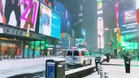 Snowfall in Times Square New York.