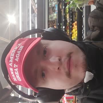 At the store with MAGA hat on