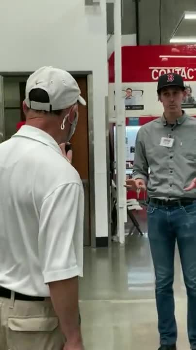 Brainwashed masker shoves and threatens Costco employees with pepper spray.