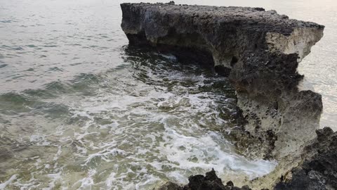 Waves show up beside the Rocks