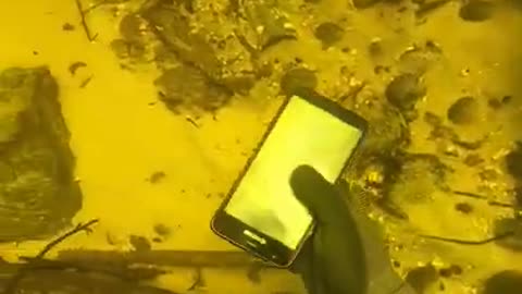 FOUND PHONE IN RIVER