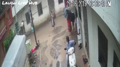 Women dies after touching electric pole