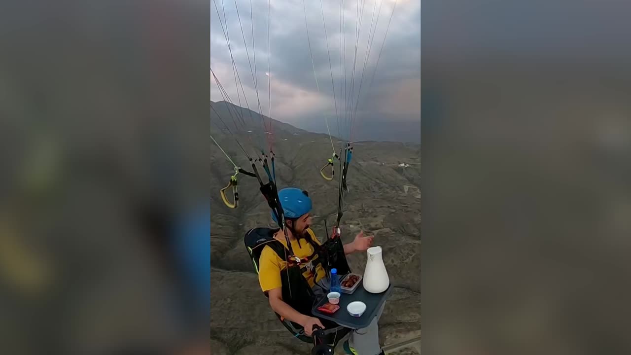 MILE HIGH GRUB: Paraglider Breaks Ramadan Fast In Mid-Air