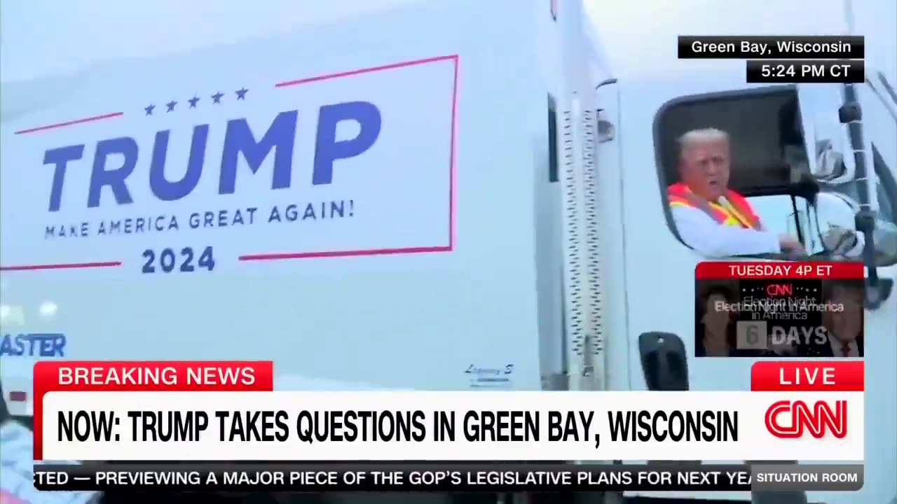 Trump Rides to Rally in Garbage Truck