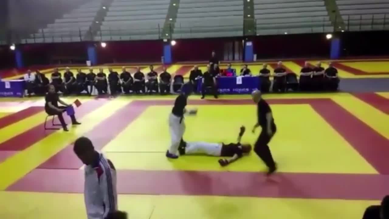 Wrestler Knocks Down Her Opponent With A Quick Hit