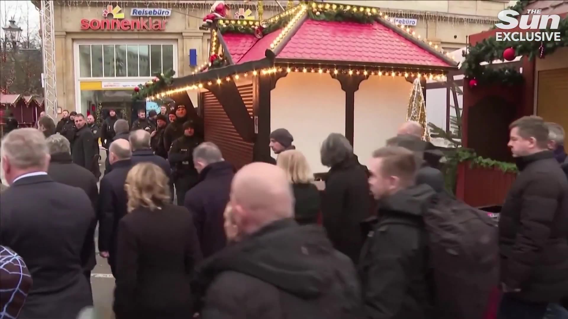 Moment cops arrest doctor who 'ploughed through German market crowd killing at least 5'