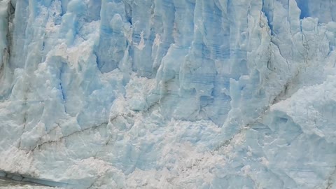 Ice Chunk Falls from Glacier