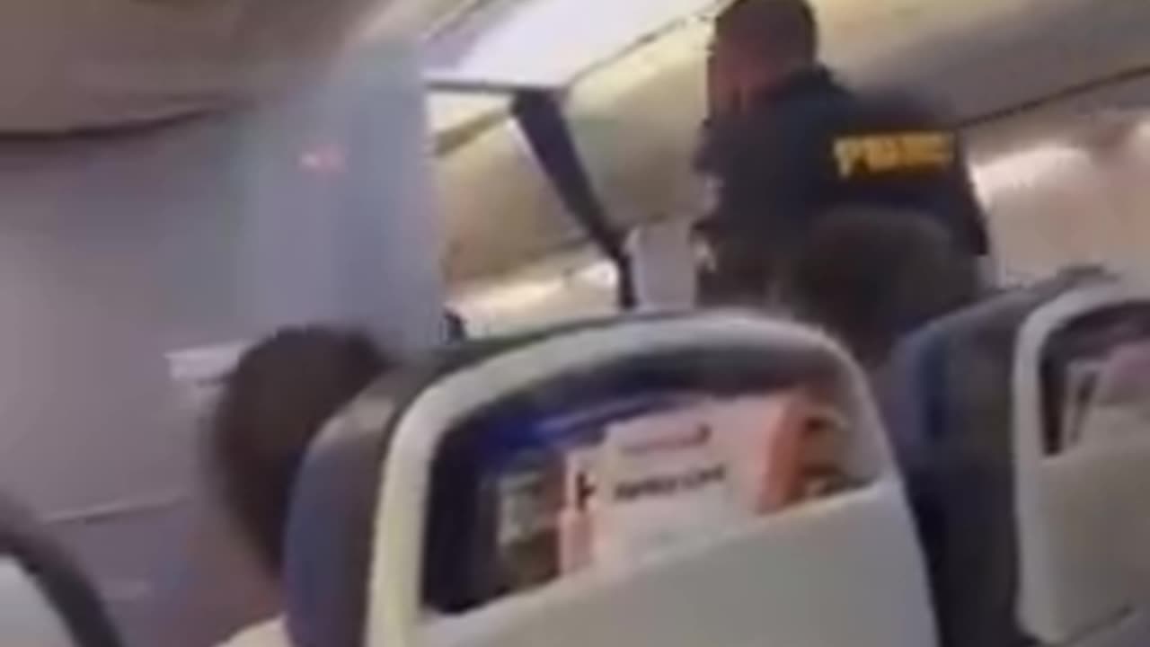 A United passenger loses what little mind she has left in flight.