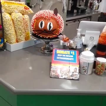 Halloween cat is missing an ear. Still cute!