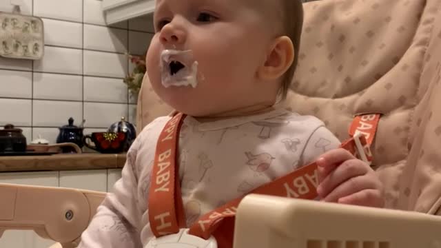 Cute baby eating yummy