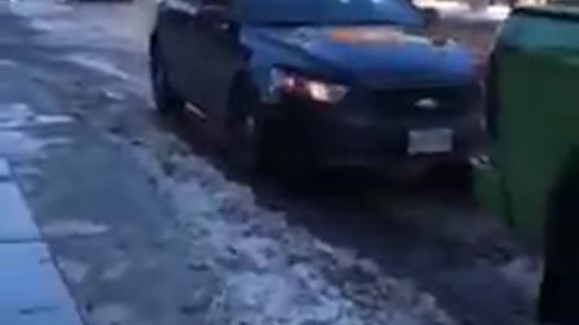 Canada cop intentionally backs into protestor's truck. Blames HIM.