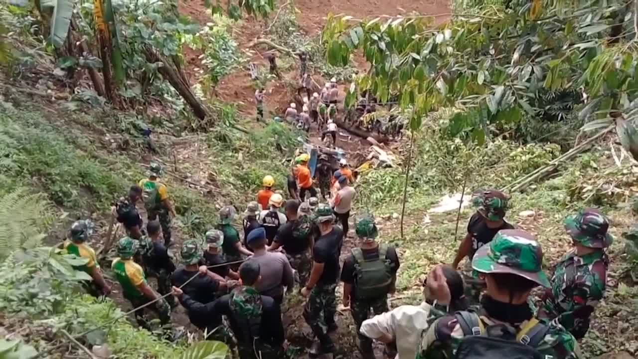 Images of destruction and search for victims after deadly Indonesia earthquake