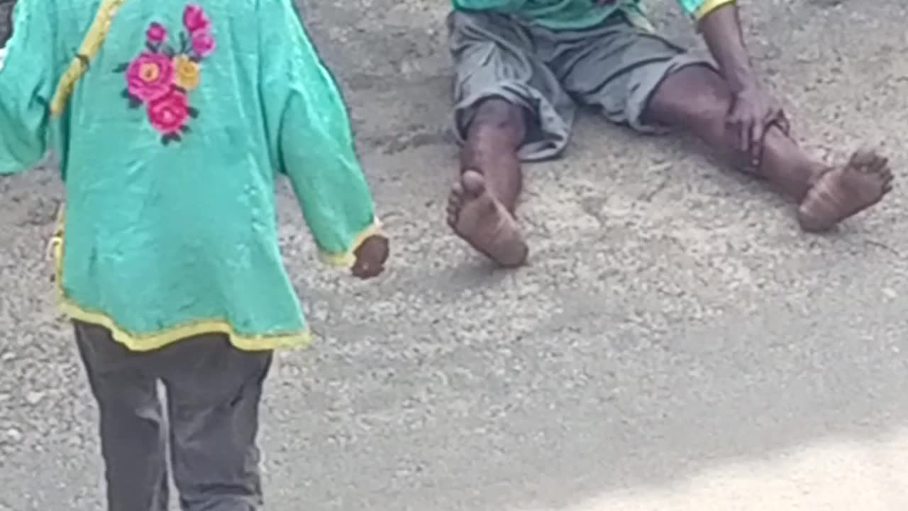 A homeless Liberian man showning of his talent