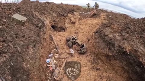 Ukrainians Move Through Russian Trenches Full of Mud and Dead Russians