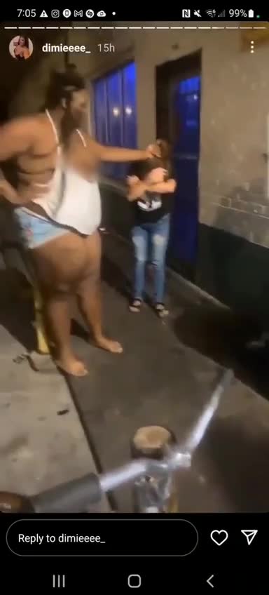 Giant black girl beating up little White lady