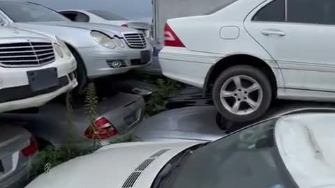 Car repair in abandoned parking area