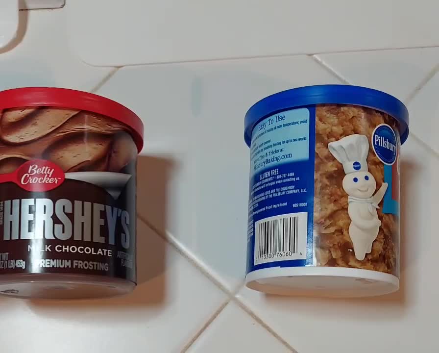 Tub of Coconut Pecan Cake Icing Hitting the Floor for No Reason
