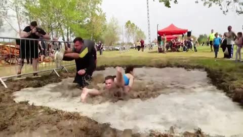 Hungarian Couples Compete in Wife-Carrying Race