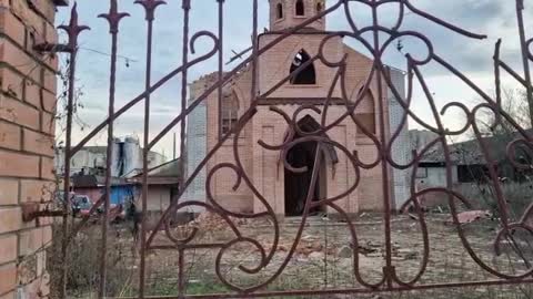 The exterior and altar of a destroyed church