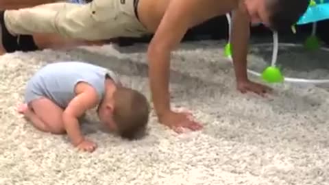 cute baby play with father