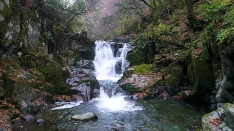 High mountain and flowing water