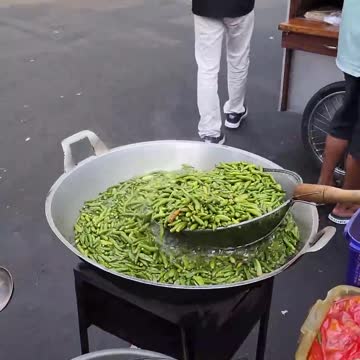 Traditional Ayam Penyet of Indonesia with Mashed Green Chilli