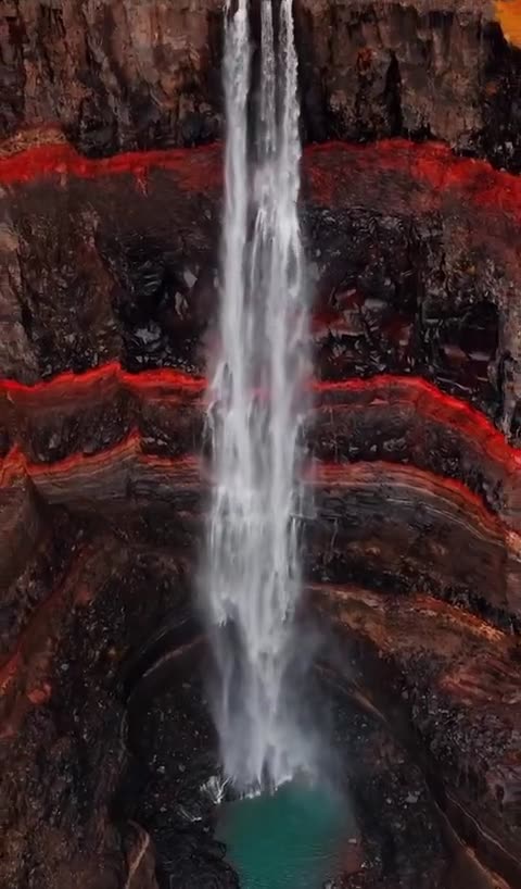 Massive waterfall, Hengifoss in northeast Iceland!