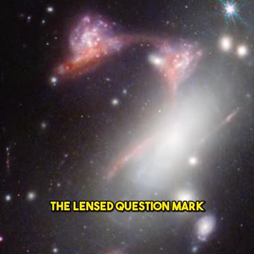 Mind-Blowing_ NASA's Webb Spots a Question Mark-Shaped Galaxy Cluster