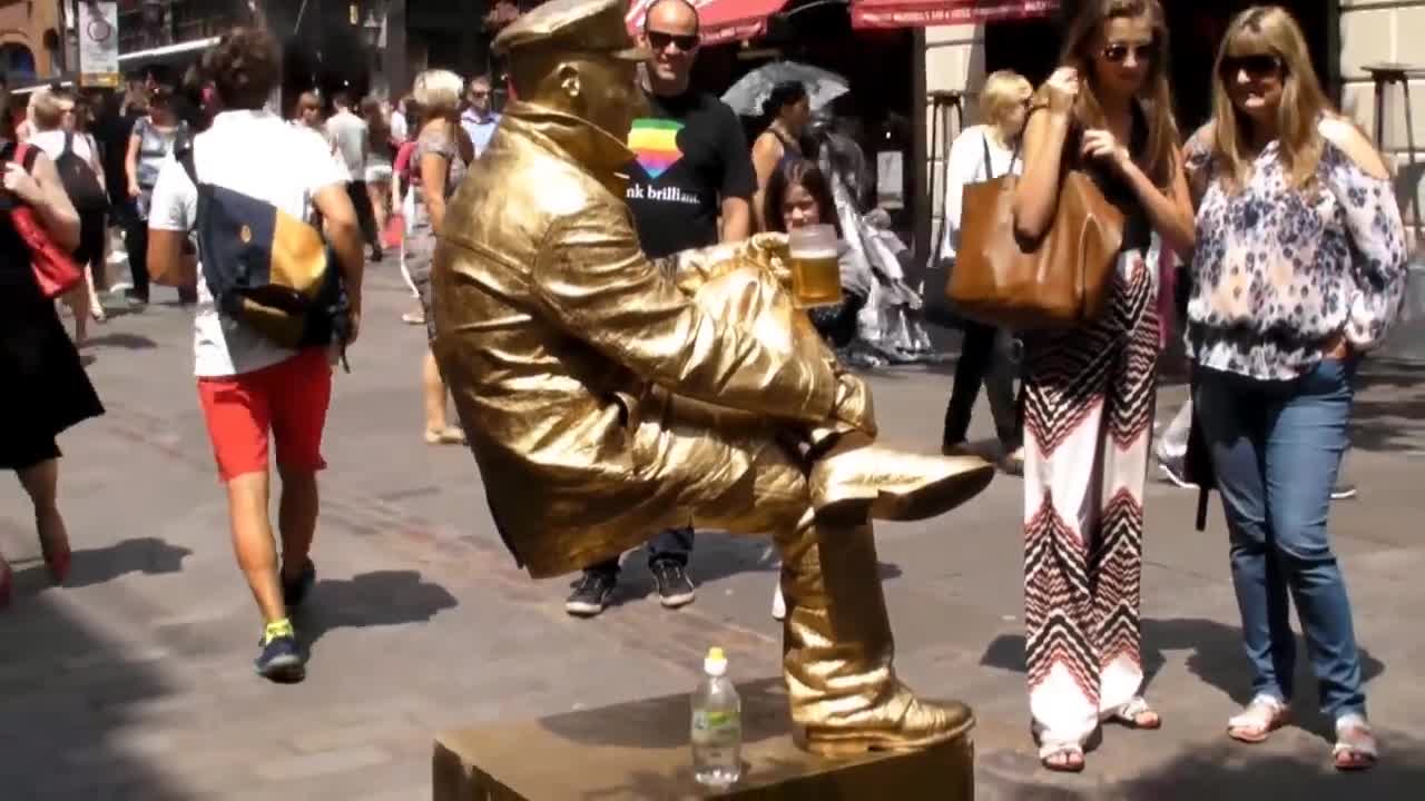 Man Sitting on Nothing. Floating and Levitating. London. Street Performance and Street Art