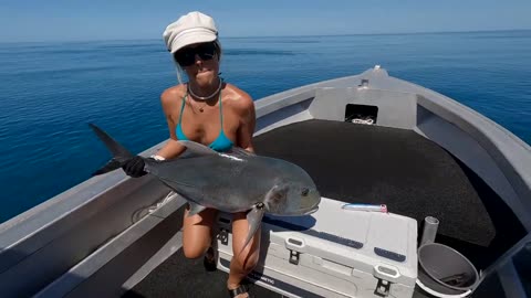 Fish Huntress Amy catching big fish in a Fishing Heaven EP 4