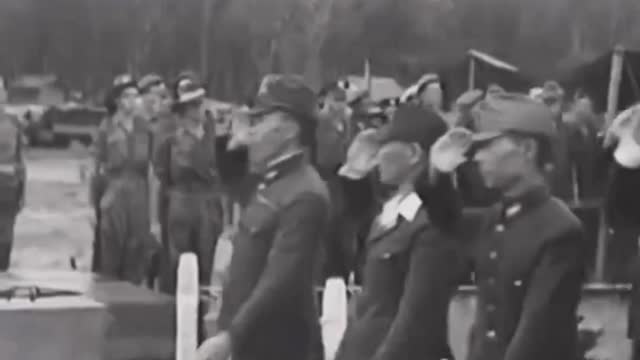 Japanese troops surrender to the United States.