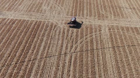 Grain Bin and Combine the closeup of combine and wave from Jerald