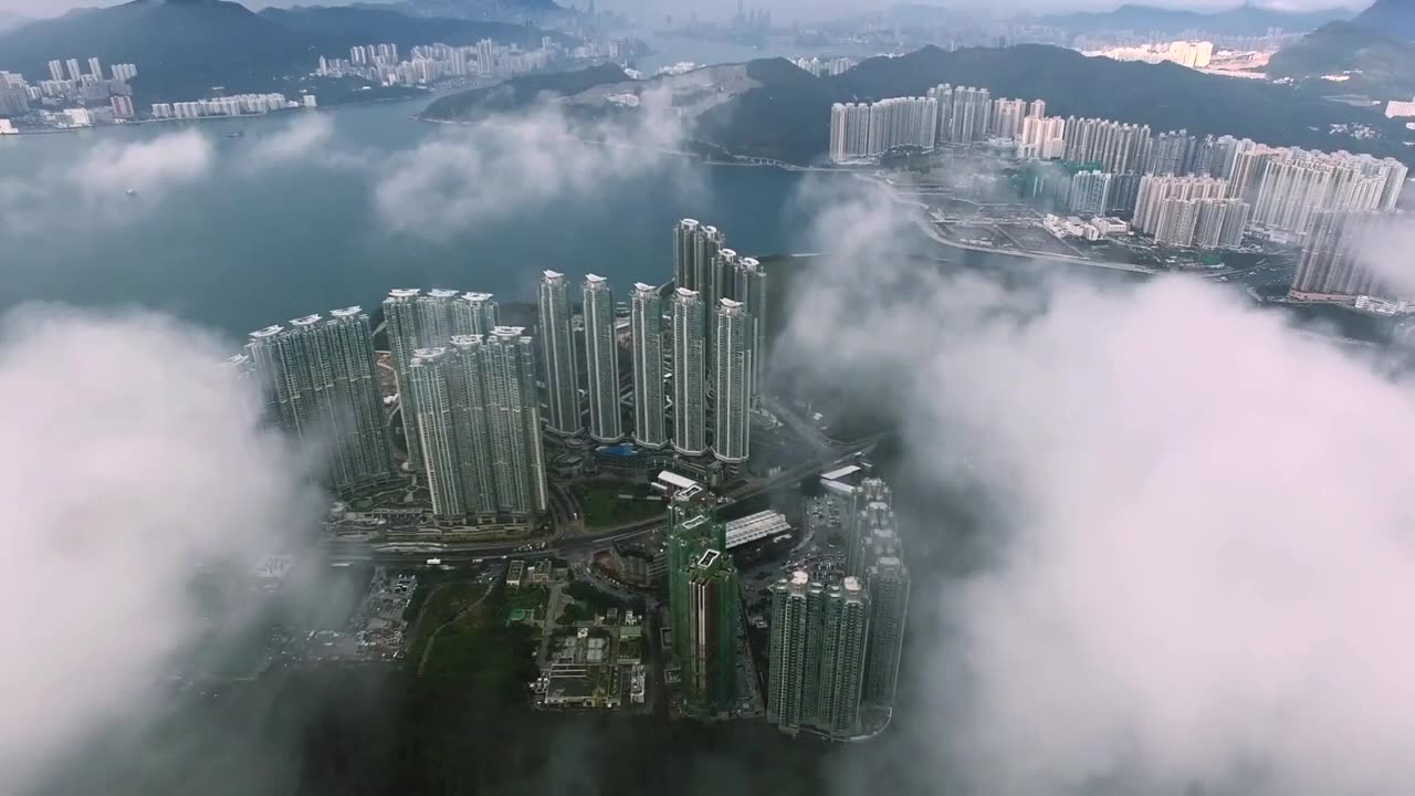 Drone in clouds with City view