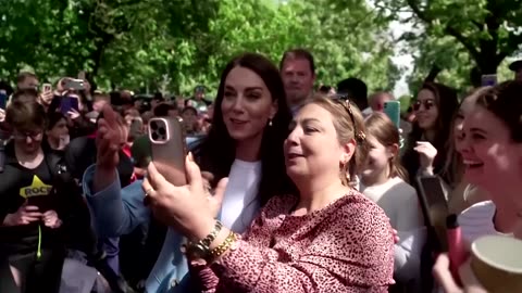 Princess Kate hugs crying girl during walkabout