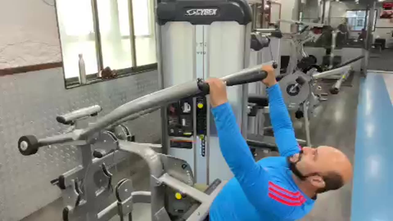 Lat pull downs for the lattissimus dorsi.