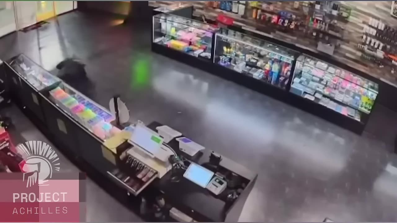 CLERK USES GUN TO DEFENDS HIMSELF