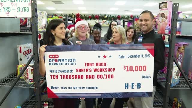 Fort Hood children get to choose toys at Santa's Workshop