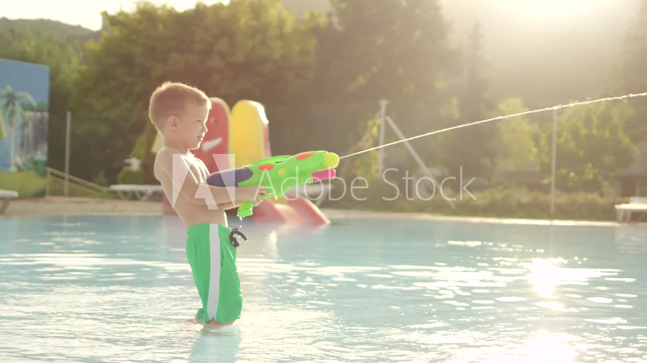 Outdoor Children Playing Water Fights Even The Netflix Squirt