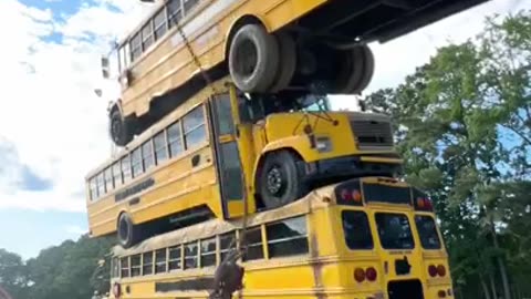 How many school buses can we stack | Mr Beast