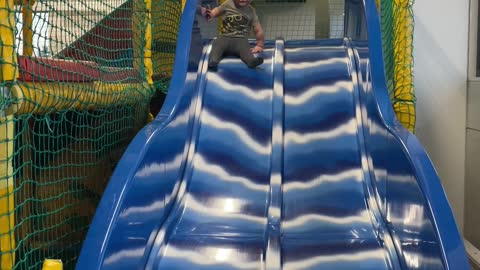 Toddler Bumps Head Going Down Slide