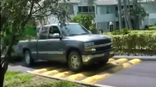 Trucks are repaired and transported by speed bumps.