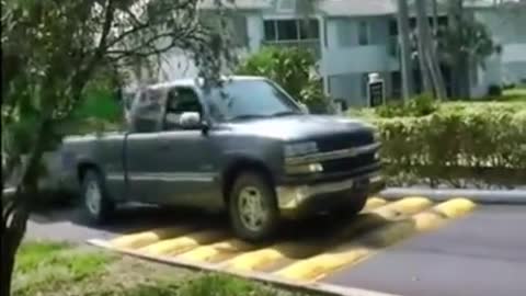 Trucks are repaired and transported by speed bumps.