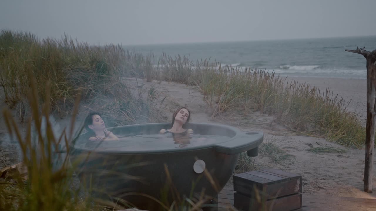 2 GIRLS BATHING IN NETURE