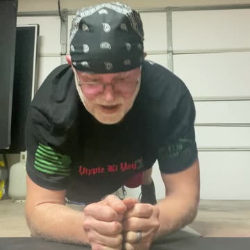 Plank Hand Taps, move 32 of 32.