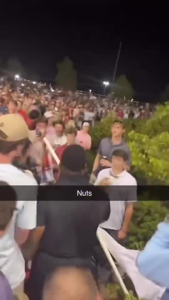 Officer seen on video CUTTING student's Trump flag at Ole Miss-Arkansas game