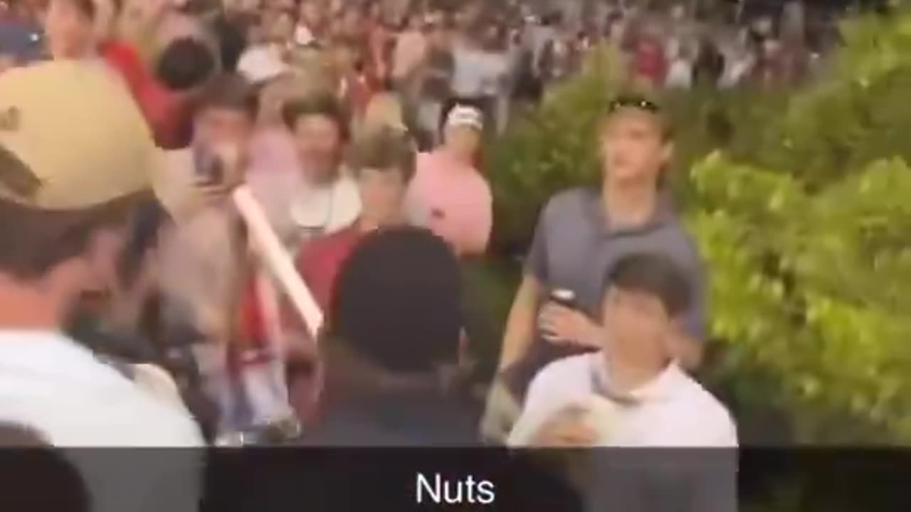 Officer seen on video CUTTING student's Trump flag at Ole Miss-Arkansas game