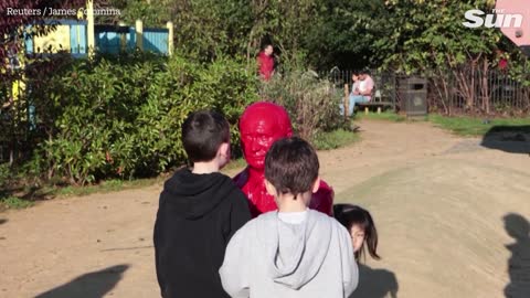 Plastic statue of Putin on tiny tank turns up in London park